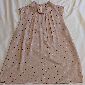 Polka dot sleeveless blouse